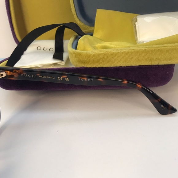 GUCCI GG0636SK 002 round Gucci sunglass comes in a dark havana frame with - Picture 10 of 11